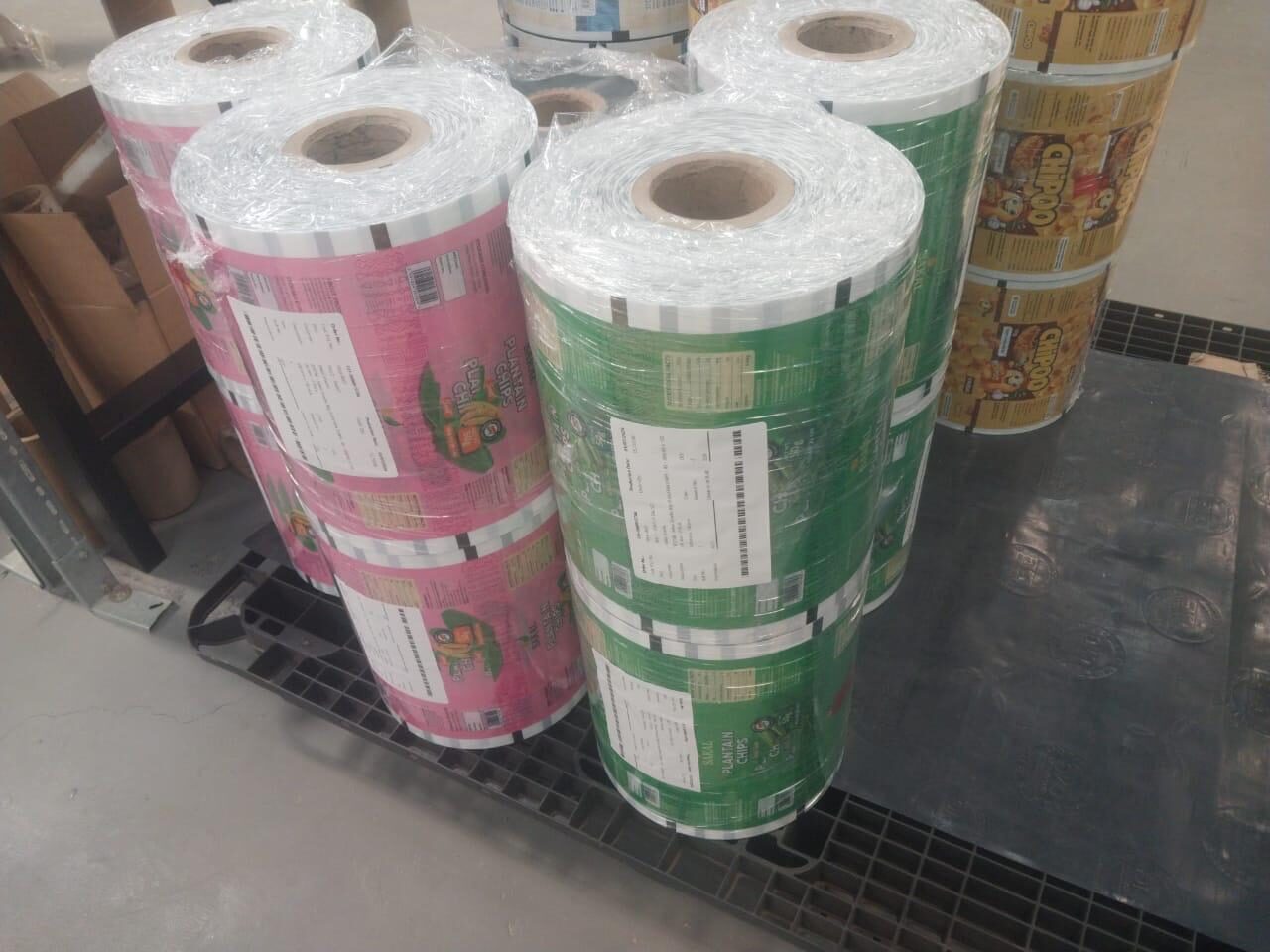 Rolls of pink and green Sakal packaging